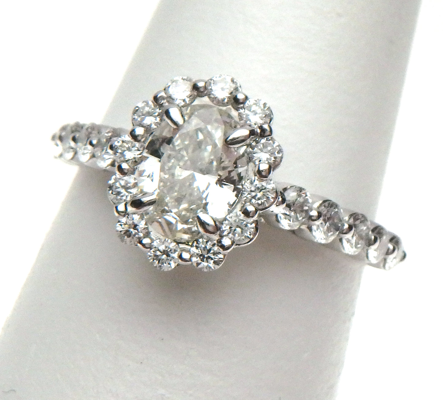 Oval Flush Halo Diamond Engagement Ring