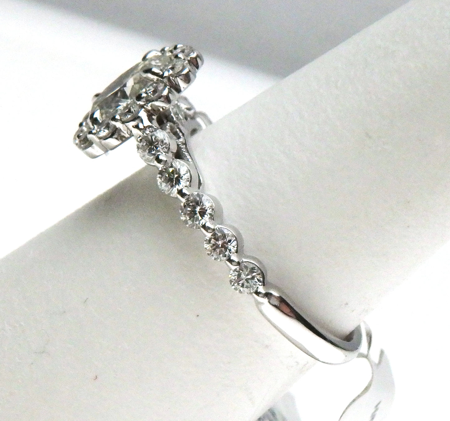 Oval Flush Halo Diamond Engagement Ring